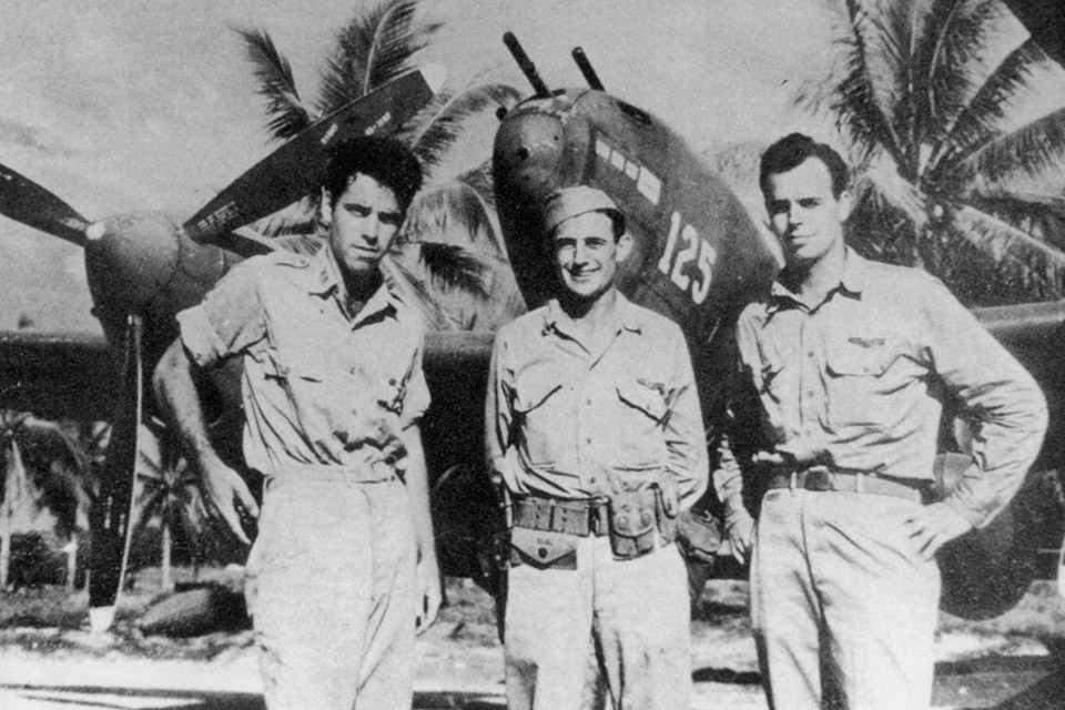 From left: Lanphier, Lt. Besby Holmes and Barber, three of the four "killer flight" pilots, pose for a photo on the day after the mission. The fourth pilot, Lt. Raymond Hine, did not return and was never found. (National Archives)