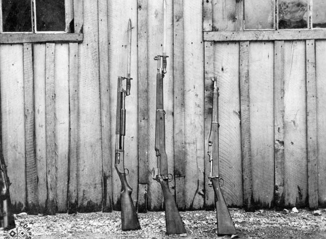 From left, Winchester M1897 trench gun, a 1917 Lee–Enfield and Springfield 1903 rifle. (HistoryNet Archives)