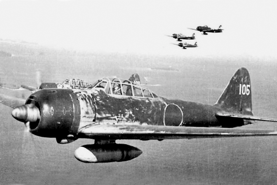 Hiroyoshi Nishizawa, Japan's highest scoring Zero pilot, leads a flight of A6M3 Model 22s of the 251st "Kokutai" from Rabaul in 1943. (National Archives)