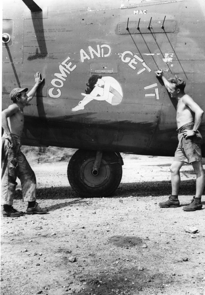 Crewmen Of The 43rd Bomb Group 64th Squadron Admiring Their B-24's Nose ...