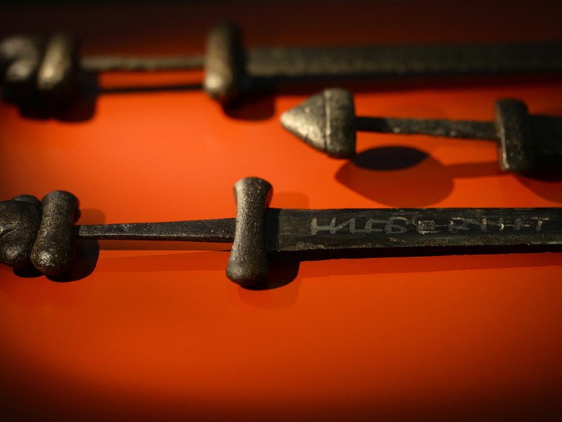 A Viking 'ulfberht sword' (Foreground) originating from Russia, and dating back to 900-1000 AD is pictured duing a photocall for the 'Vikings: Life and Legend' exhibition at the British Museum in London, on March 4, 2014