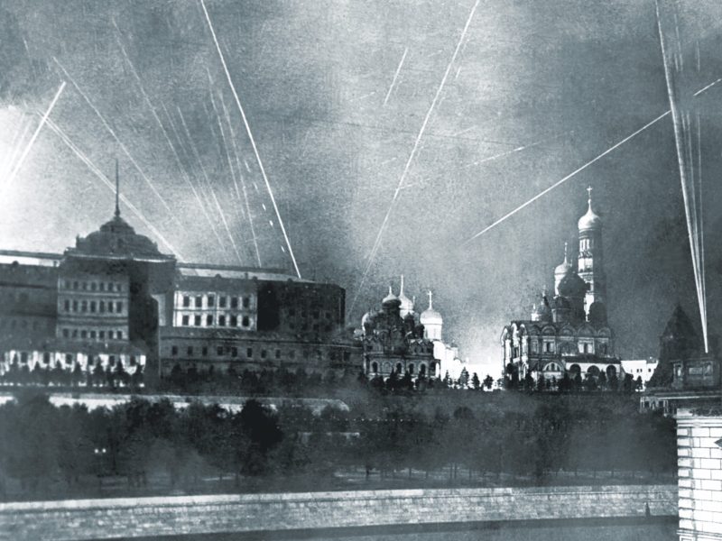 Soviet antiaircraft fire and searchlights punctuate the night sky over Moscow. Fear built below, leading to the October 16, 1941, day of the “Great Panic.” (Naum Granovsky/TASS via Getty Images)