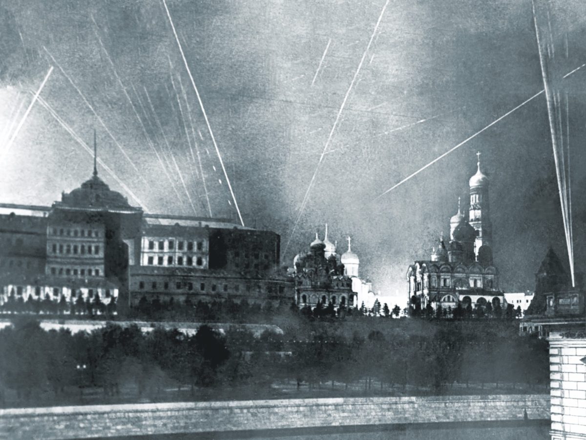 Soviet antiaircraft fire and searchlights punctuate the night sky over Moscow. Fear built below, leading to the October 16, 1941, day of the “Great Panic.” (Naum Granovsky/TASS via Getty Images)