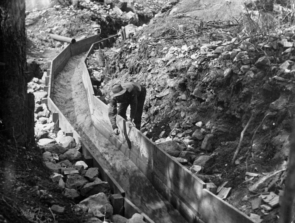 California Miner Sluicing for Gold