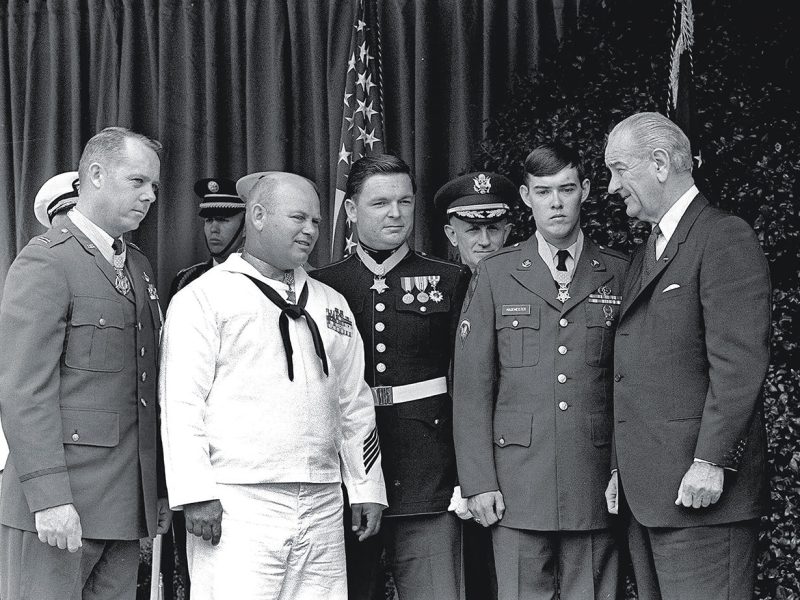 President Lyndon Johnson, right, poses May 14, 1968 at the White House with four winners of the nation's highest award, the Medal of Honor. Decorated for valor in Vietnam, they are, from left: Air Force Capt. Gerald O. Young, of Anacortes, Wash.; Navy Bosn"s Mate James E. Williams, of Rock Hill, S.C.; Marine Sgt. Richard A. Pittman, of Stockton, Calif. and Army Spc. 5 Charles C. Hagmeister, of Lincoln, Neb. Others are unidentified. (AP photo)