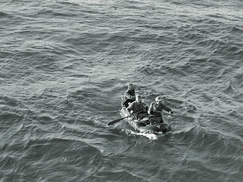 Luftwaffe unit paddling a raft in the Mediterranean