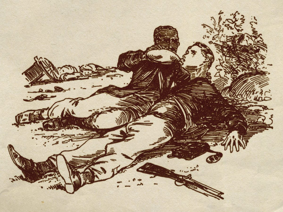 A soldier gives his comrade water from a canteen