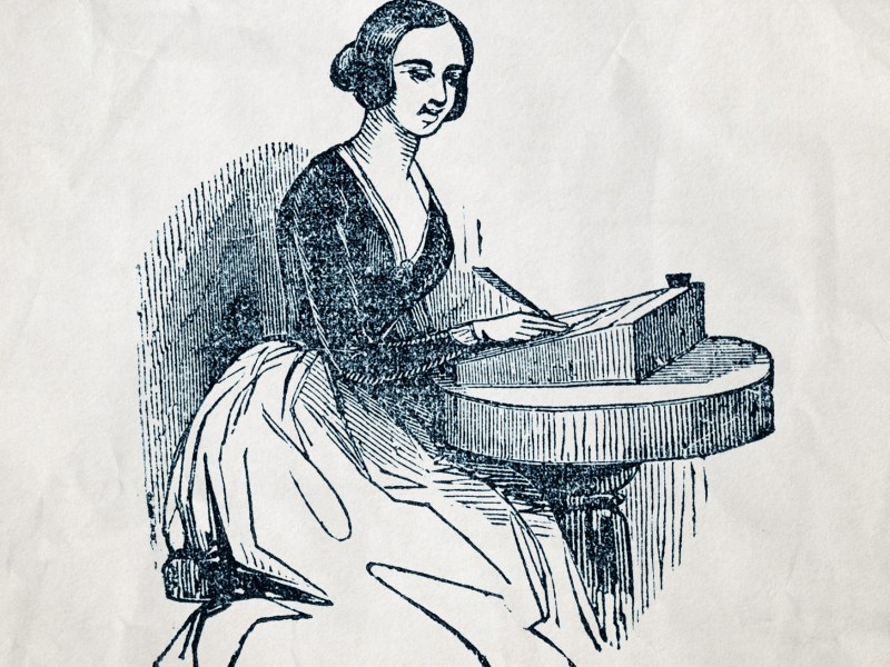 Woman at writing table
