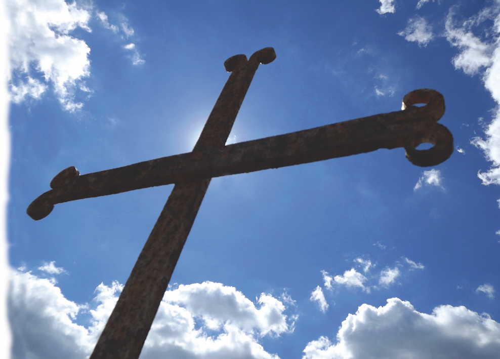 Traditional French cross decorating a grave in Old Mines, Missouri.