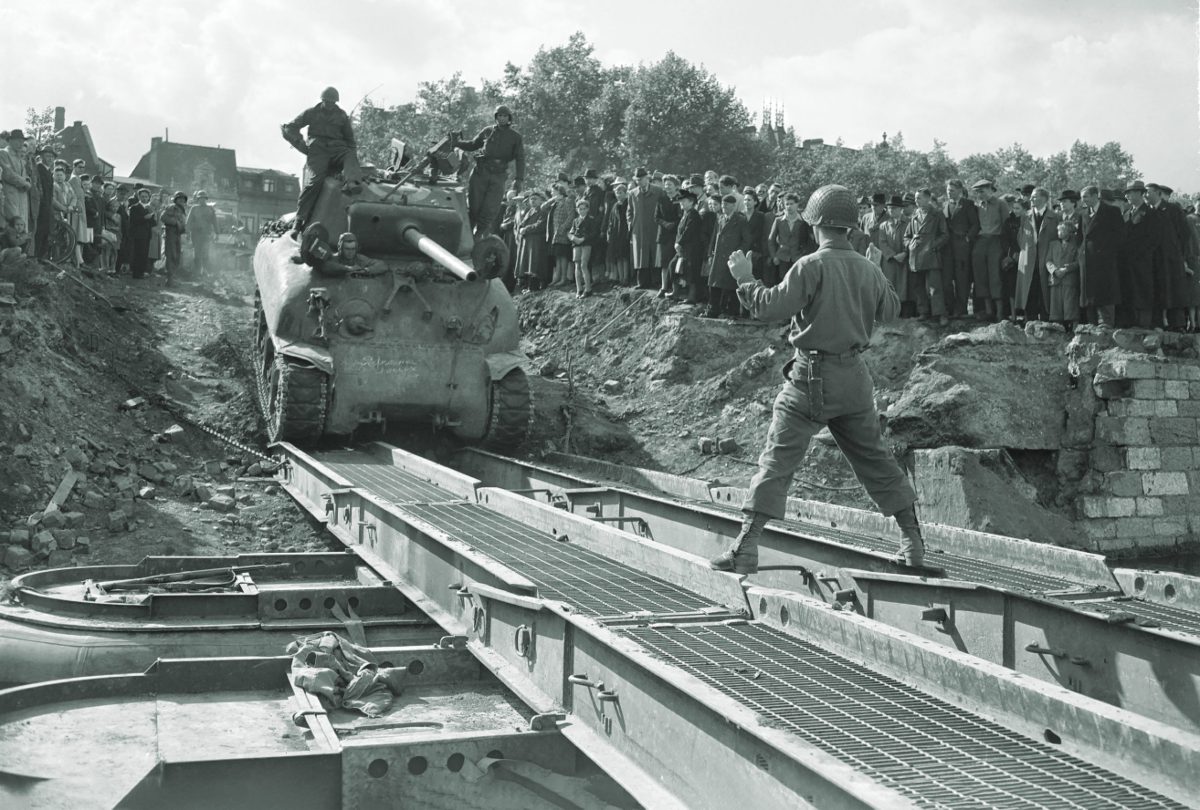 war-daddy-crosses-pontoon-bridge-in-belgium