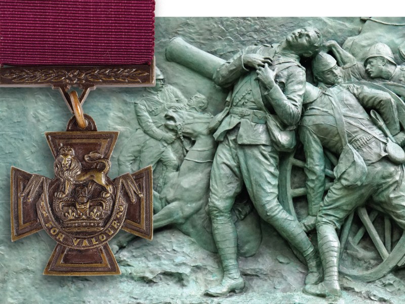 Victoria Cross with Canadian soldiers on monument