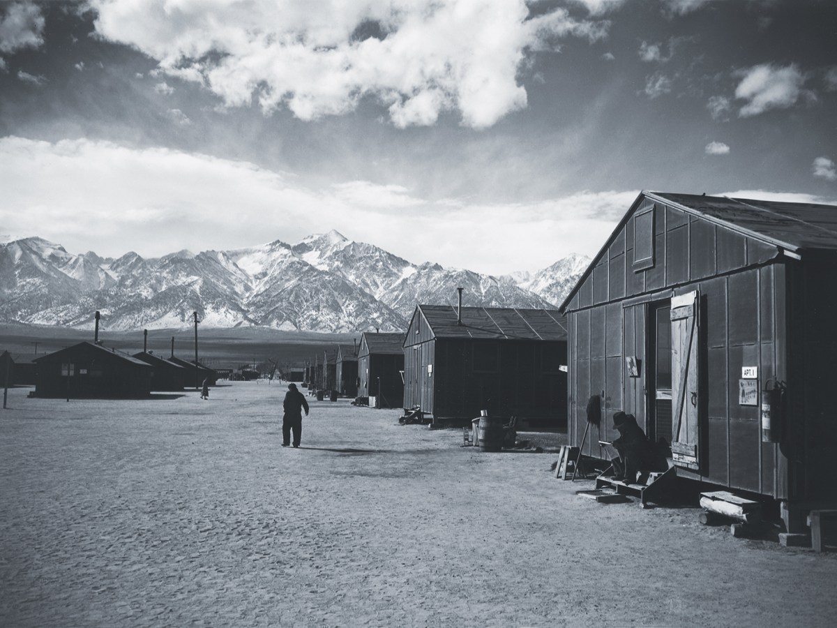 Photo of Manzanar Relocation Center. During the winter the Manzanar Relocation Center had no hope of disguising itself as anything but what it was: punitive confinement.