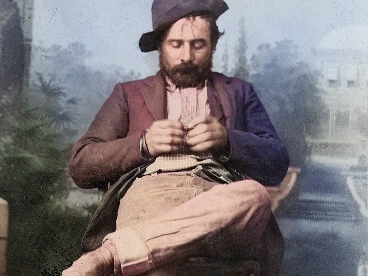 Kid Curry seated in Deadwood jail