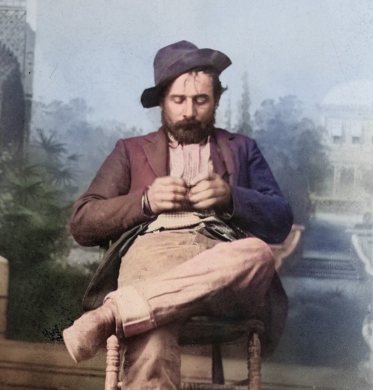 Kid Curry seated in Deadwood jail