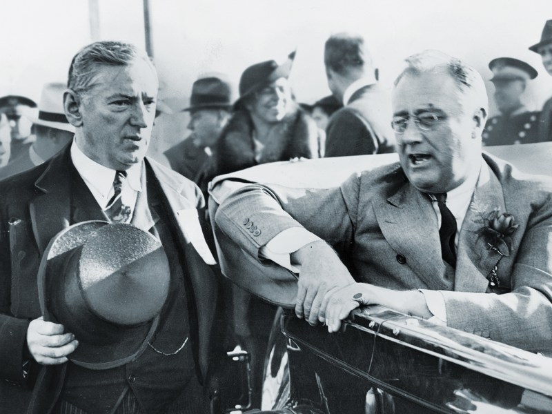 Photo of James Michael Curley bending the ear of President Franklin D. Roosevelt in 1936.