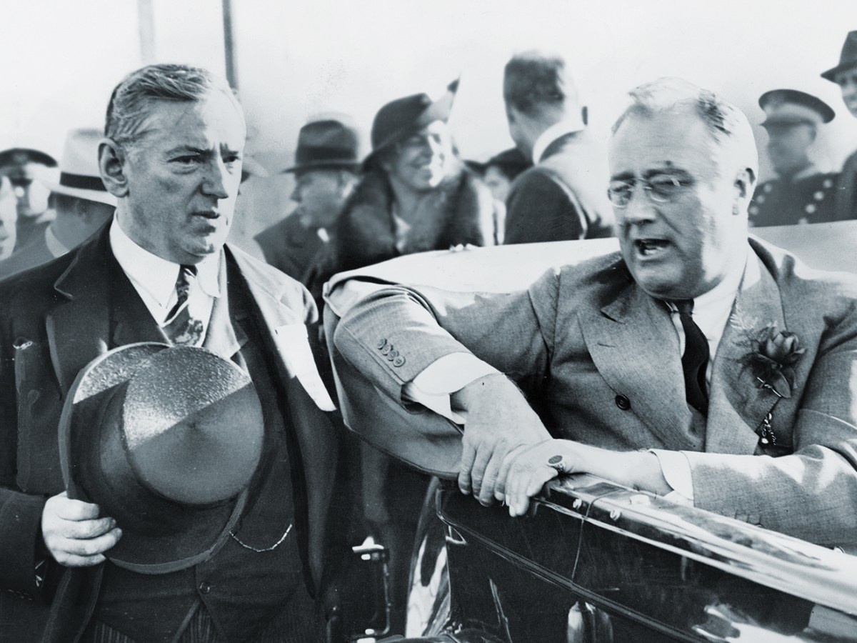 Photo of James Michael Curley bending the ear of President Franklin D. Roosevelt in 1936.