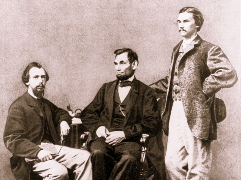 John Nicolay and John Hay with President Lincoln