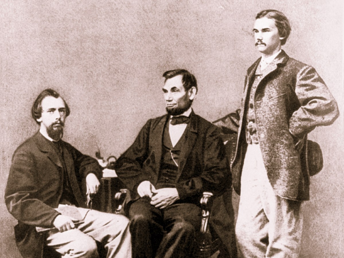 John Nicolay and John Hay with President Lincoln