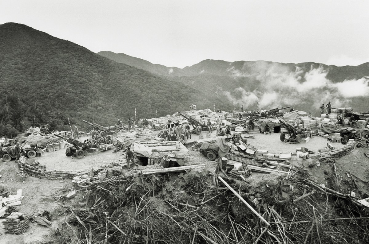 Photo of U.S Soldiers from the 101st cavalry division have set up these 105mm howitzers in a sand bagged fire-base at an elevated site in the center of the a Shau Valley in South Vietnam, August 12, 1968. From this position, gunners can give excellent fire support to men operating in the valley below.