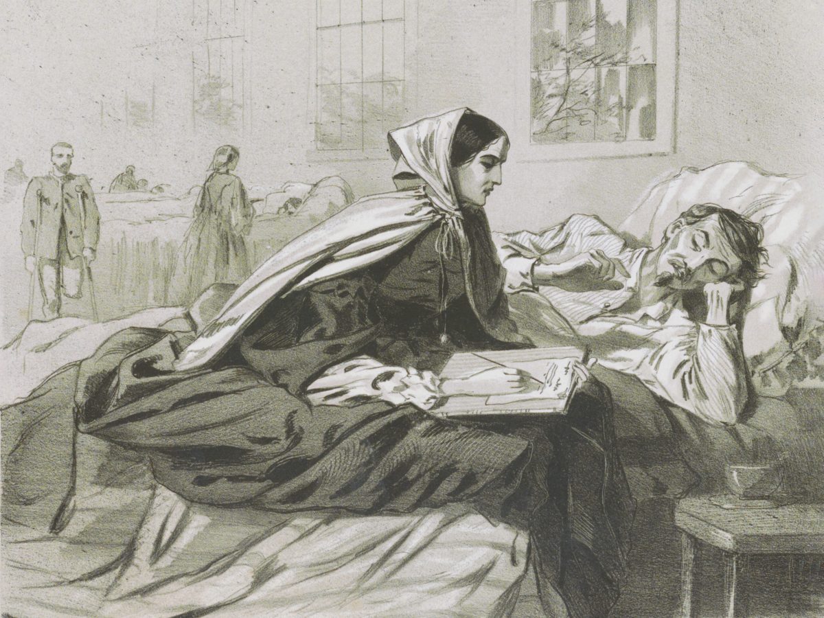 Nurse transcribing soldier's letter