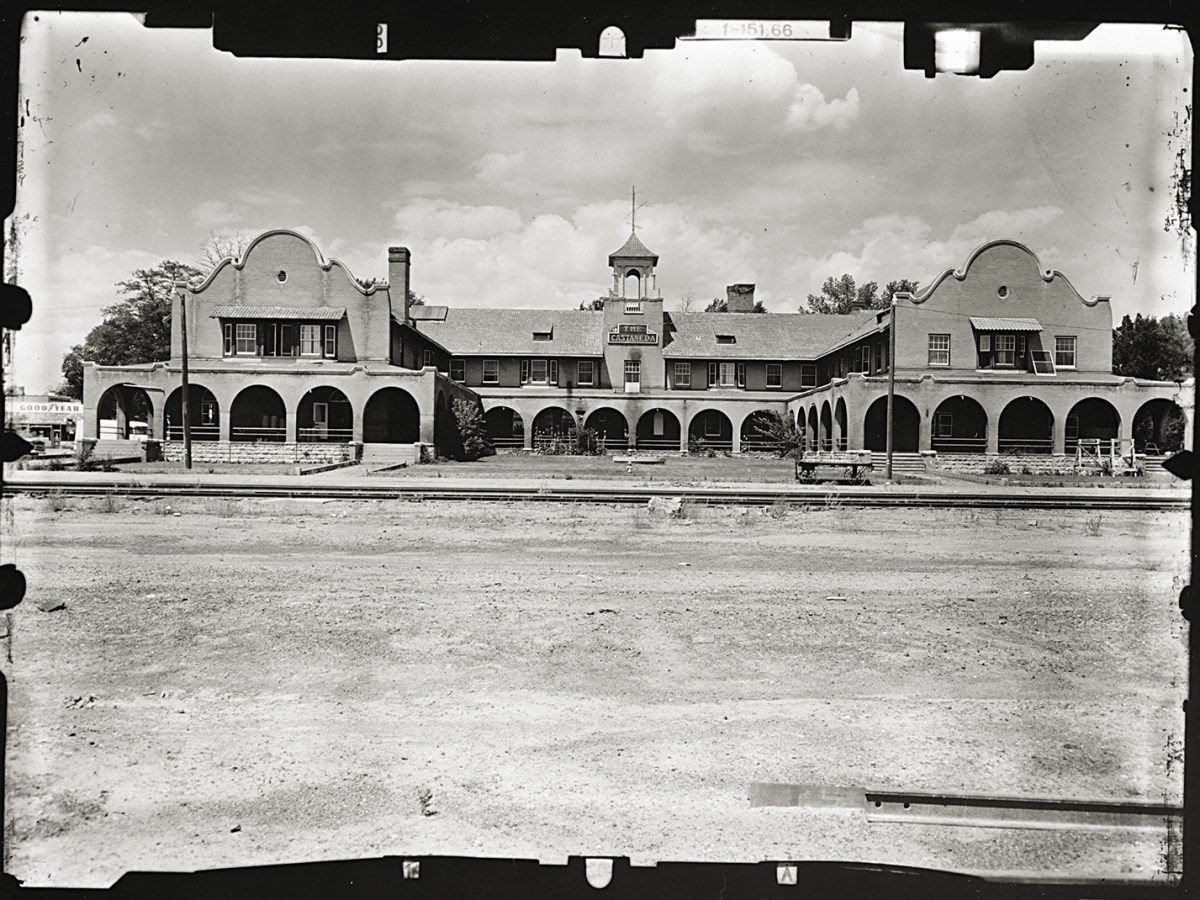 Photo of SOUTH FACADE FROM SANTA FE RAILROAD TRACKS, Castaneda Hotel, Railroad Avenue, Las Vegas, San Miguel County, NM.