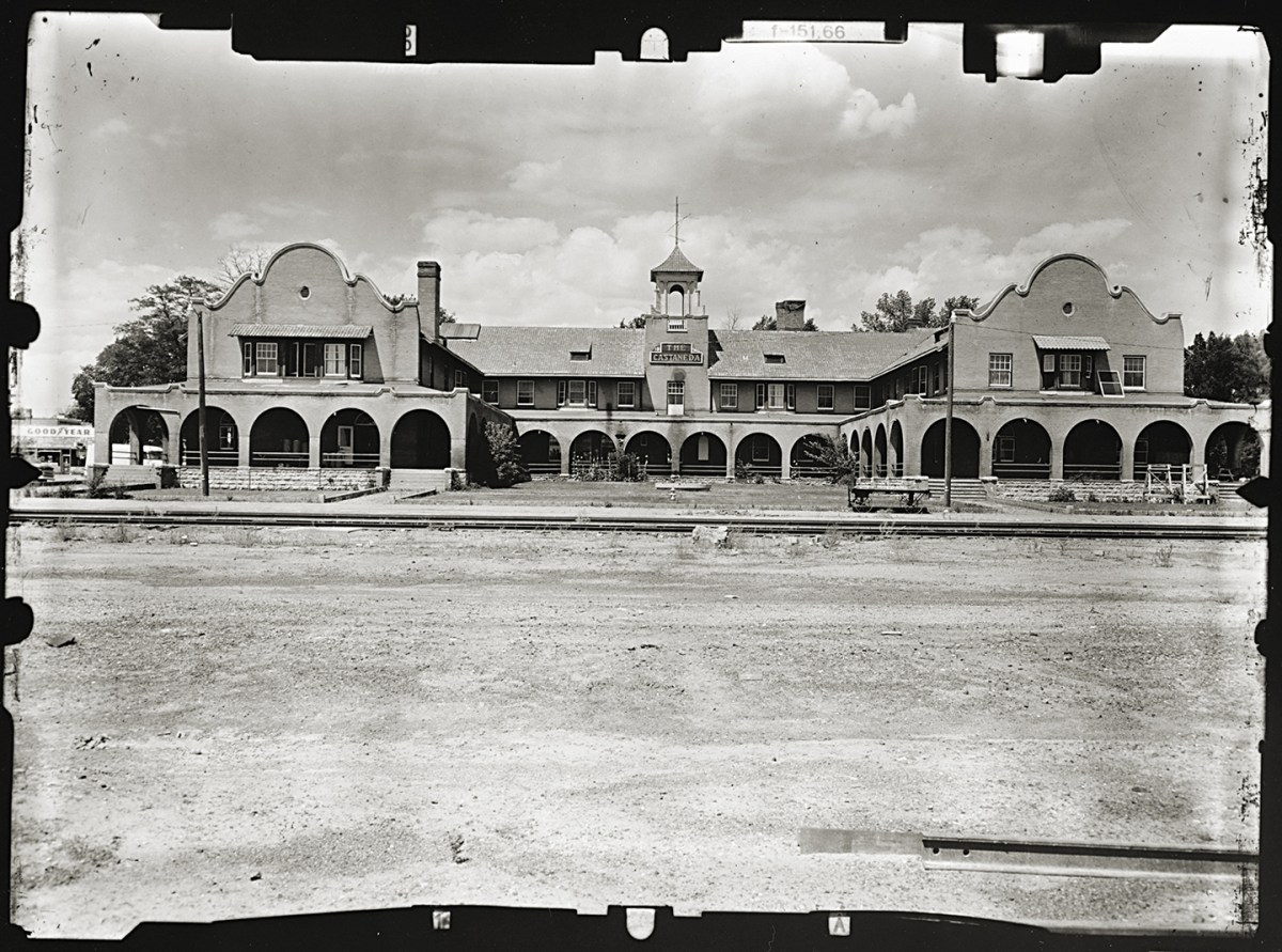 Photo of SOUTH FACADE FROM SANTA FE RAILROAD TRACKS, Castaneda Hotel, Railroad Avenue, Las Vegas, San Miguel County, NM.