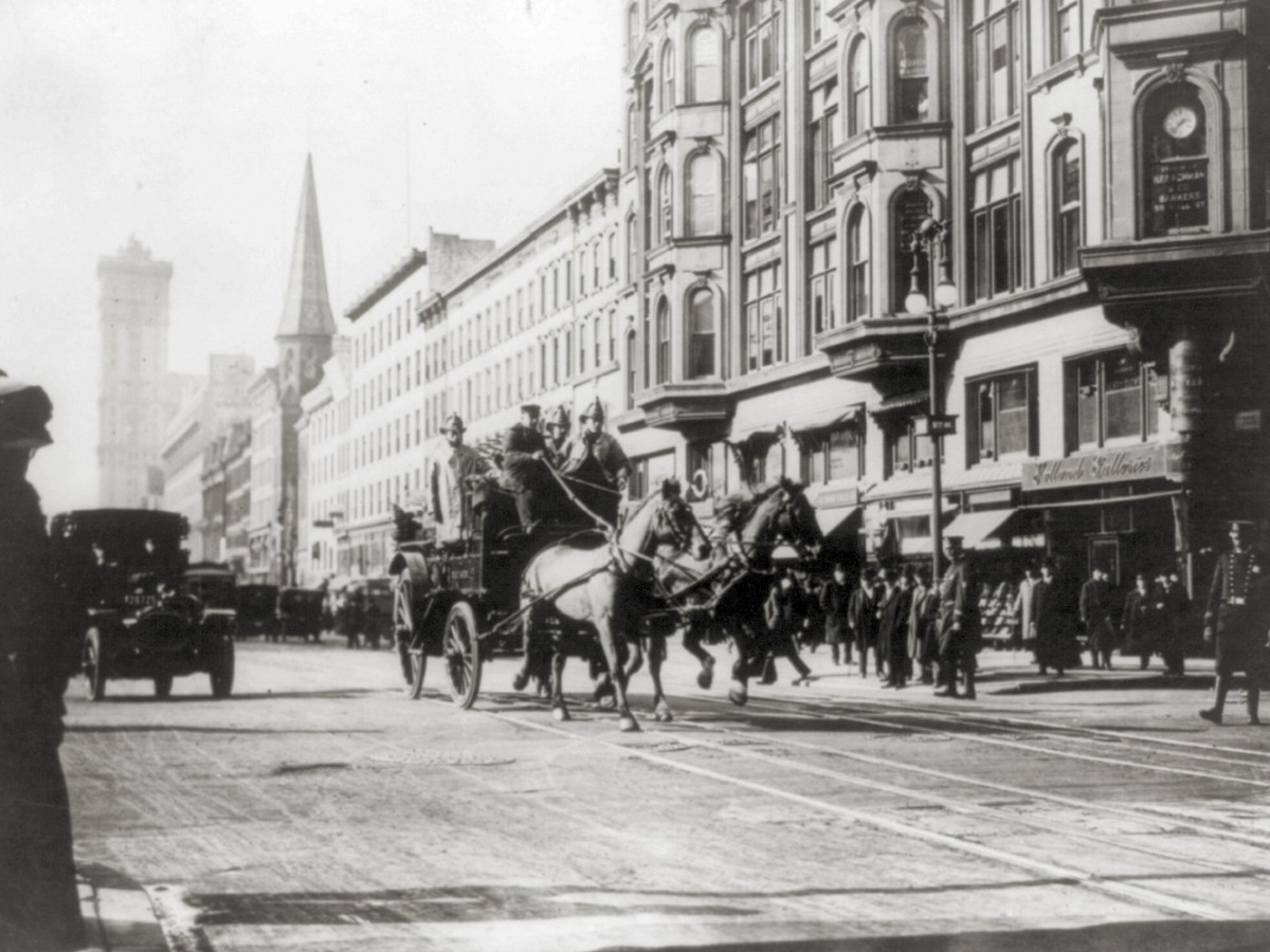 Photo of a horse-drawn fire engines in street, on their way to the Triangle Shirtwaist Company fire, New York City