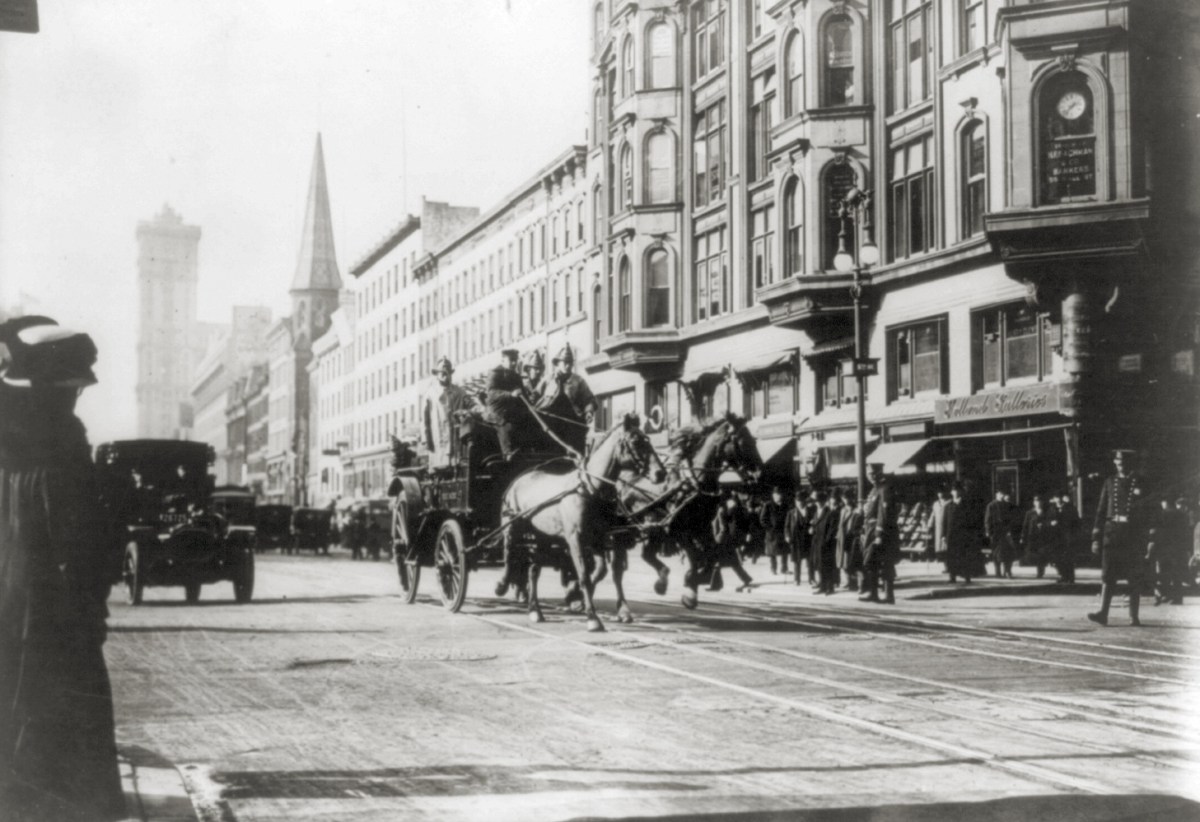 Photo of a horse-drawn fire engines in street, on their way to the Triangle Shirtwaist Company fire, New York City